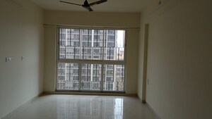 Living Room in 1 BHK Apartment at Dharti Presidio, Malad West – for Rent
