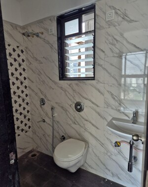 Bathroom in 2 BHK Apartment at UK Iridium, Kandivali East – for Rent