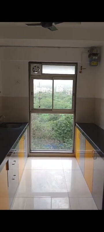 Kitchen in 2 BHK Apartment at Godrej Tranquil, Kandivali East – for Rent