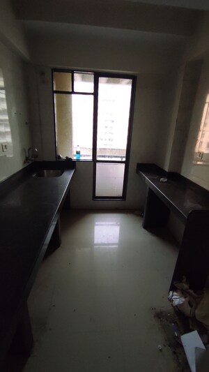 Kitchen in 1 BHK Apartment at Ajmera Yogidham Sapphire, Kalyan West – for Rent