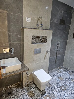 Bathroom in 3 BHK Builder Floor at Mansarover Garden – for Sale