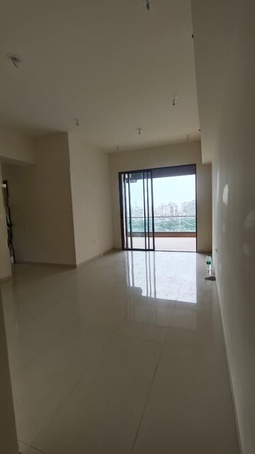 Room in 2 BHK Apartment at Mulund West – for Sale
