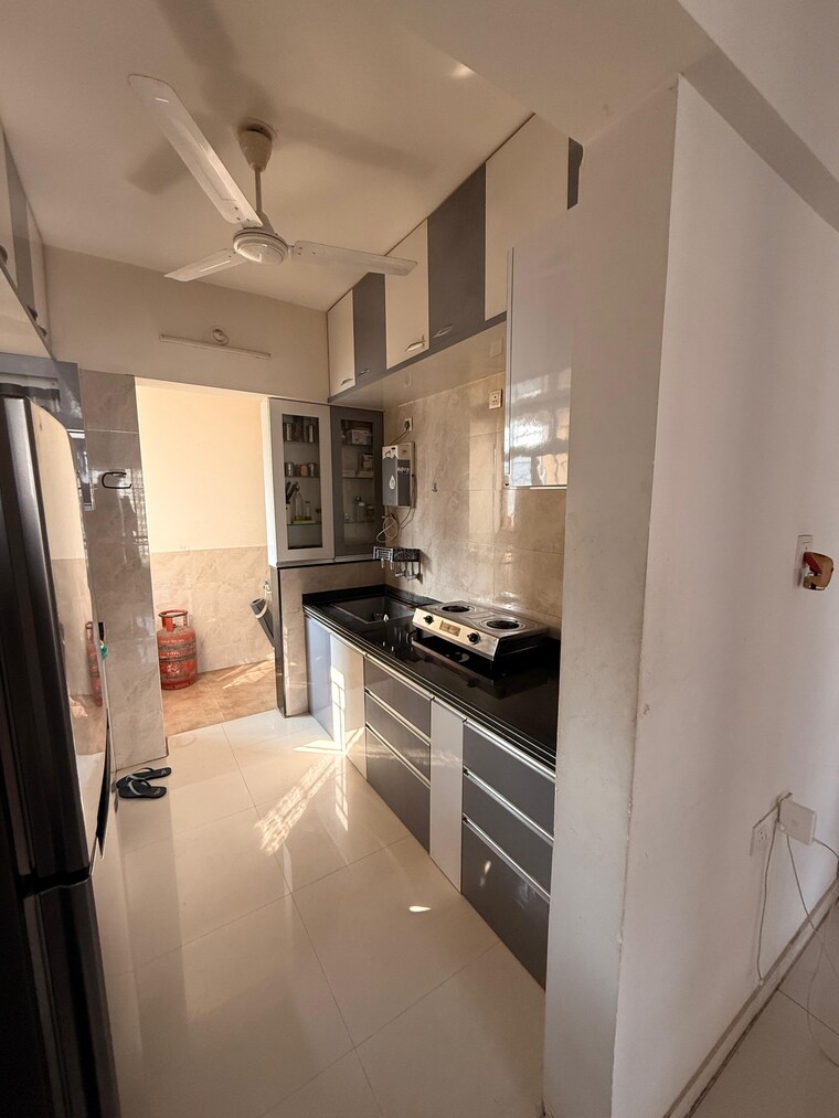 Kitchen, millennium-acropolis-2 1 Bedroom 520 Sq.Ft. Apartment In Wakad Pune 9526740