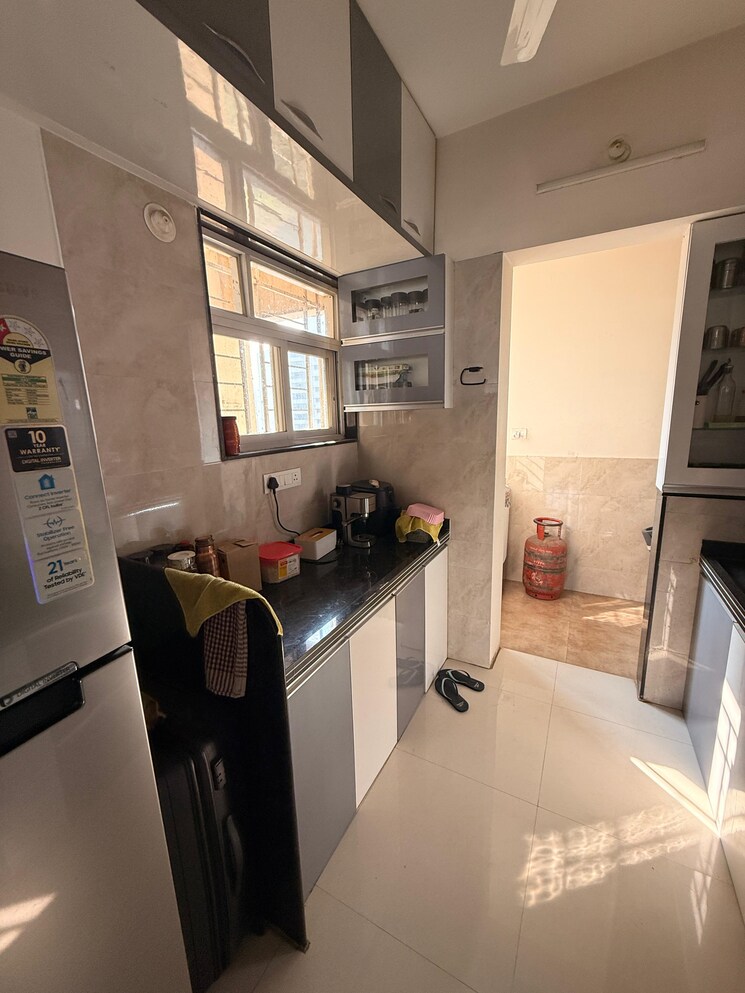 Kitchen, millennium-acropolis-2 1 Bedroom 520 Sq.Ft. Apartment In Wakad Pune 9526740