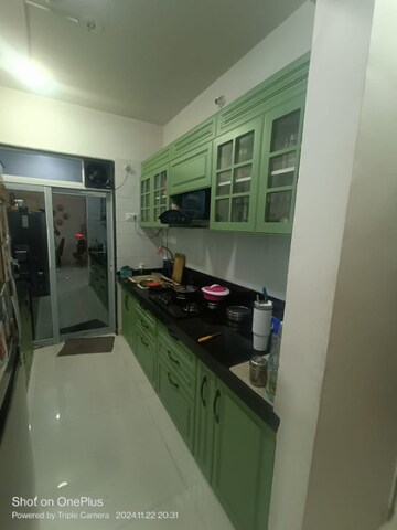 Kitchen in 2 BHK Apartment at Om Paraiso, Shilphata – for Rent