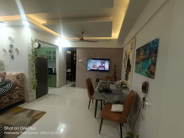 Living Room, om-paraiso 2 Bedroom 695 Sq.Ft. Apartment In Shilphata Thane 9526075