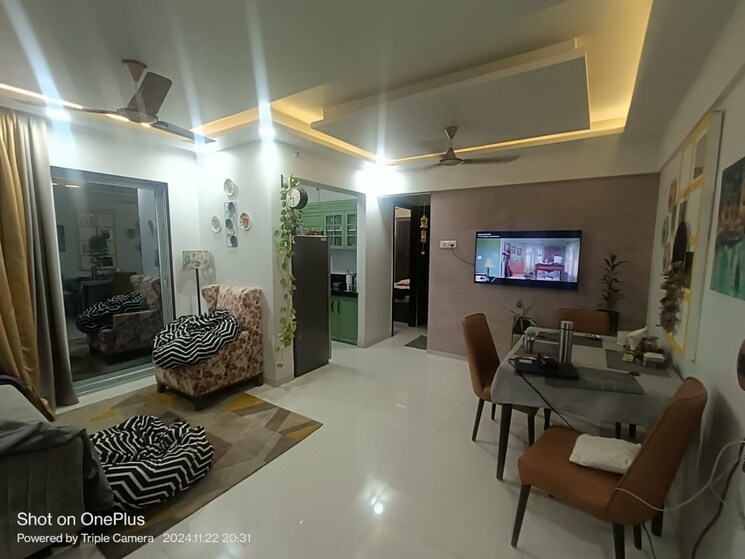 Living Room, om-paraiso 2 Bedroom 695 Sq.Ft. Apartment In Shilphata Thane 9526075