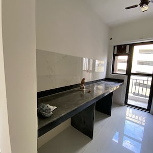 Kitchen in 2 BHK Apartment at Runwal Gardens Phase 3, Kalyan Shilphata Road – for Rent