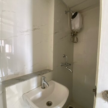 Bathroom in 1.5 BHK Apartment at Runwal Gardens Phase 3, Kalyan Shilphata Road – for Rent
