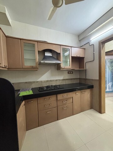 Kitchen in 2 BHK Apartment at Seawoods Sector 50 – for Rent