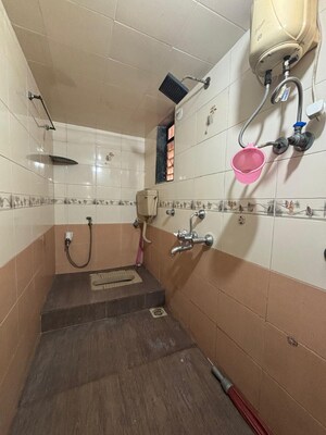 Bathroom in 2 BHK Apartment at Seawoods Sector 50 – for Rent