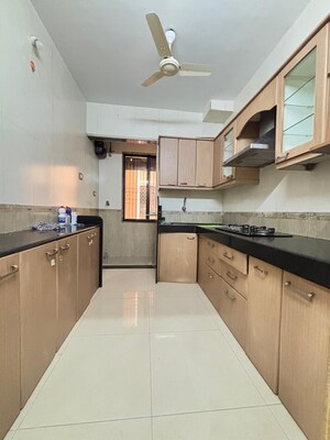 Kitchen in 2 BHK Apartment at Seawoods Sector 50 – for Rent