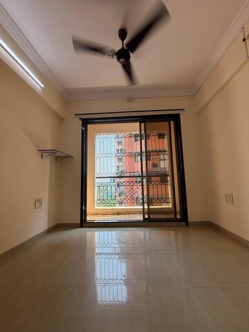 Room in 2 BHK Apartment at Ambika Heights, Nerul – for Rent