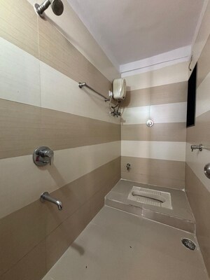 Bathroom in 2 BHK Apartment at Ambika Heights, Nerul – for Rent