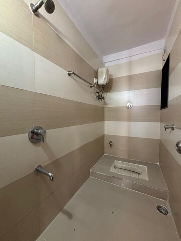 Bathroom in 2 BHK Apartment at Ambika Heights, Nerul – for Rent