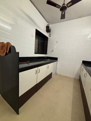 Kitchen in 3 BHK Apartment at Ekta CHS Nerul, Nerul – for Rent