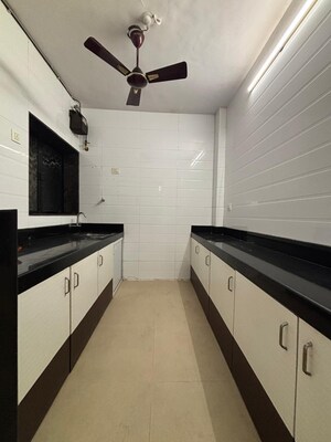 Kitchen in 3 BHK Apartment at Ekta CHS Nerul, Nerul – for Rent