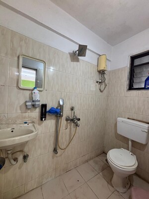 Bathroom in 2 BHK Apartment at Shelter Arcade, Seawoods Sector 42 – for Rent