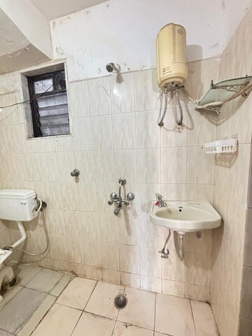 Bathroom in 2 BHK Apartment at Shelter Arcade, Seawoods Sector 42 – for Rent