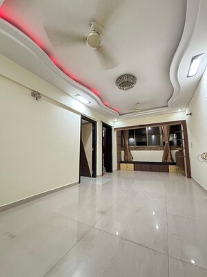 Building Lobby in 2 BHK Apartment at Badri Kedar Building, Seawoods Sector 40 – for Rent