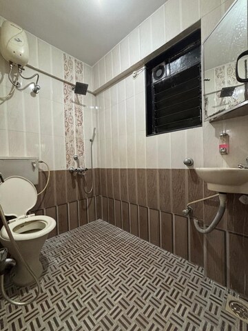 Team Area in 2 BHK Apartment at Badri Kedar Building, Seawoods Sector 40 – for Rent