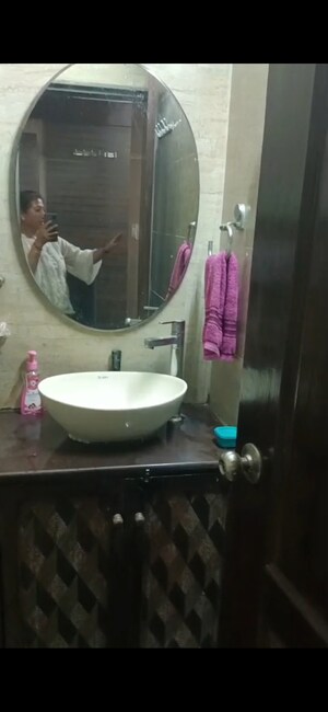 Bathroom in 1 BHK Apartment at Kiran Chandra CHS, Andheri West – for Rent