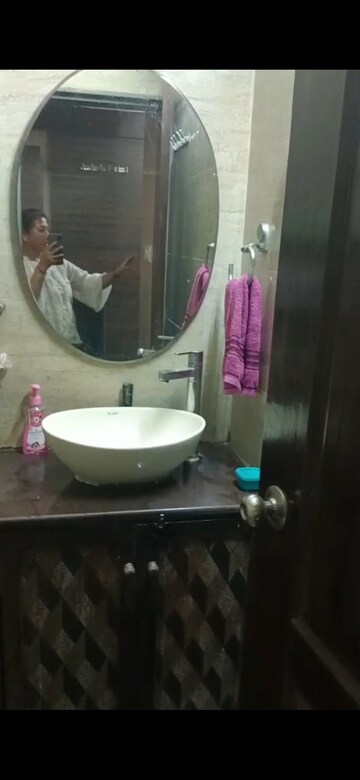 Bathroom in 1 BHK Apartment at Kiran Chandra CHS, Andheri West – for Rent