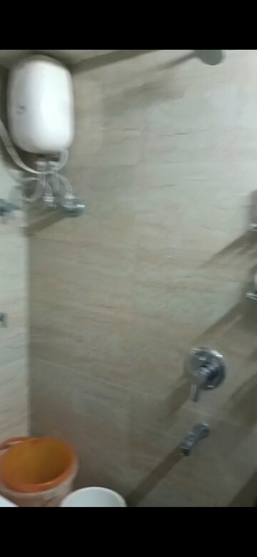 Bathroom in 1 BHK Apartment at Kiran Chandra CHS, Andheri West – for Rent