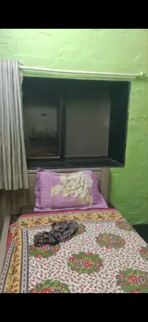 Bedroom in 1 BHK Apartment at Kiran Chandra CHS, Andheri West – for Rent