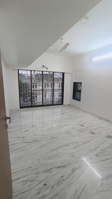 Room in 4 BHK Apartment at Amal Mangal Meeth CHS, Juhu – for Rent