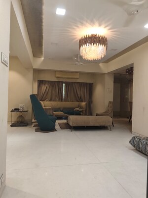 Living Room in 4 BHK Apartment at Amal Juhu Sheetal CHS, Juhu – for Rent
