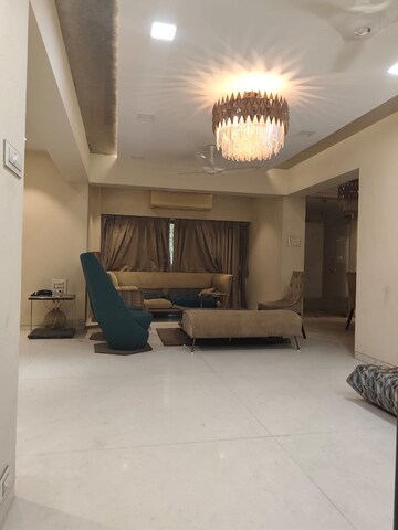Living Room in 4 BHK Apartment at Amal Juhu Sheetal CHS, Juhu – for Rent