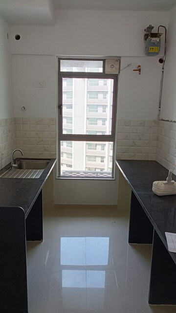 Kitchen in 2 BHK Apartment at Kalpataru Immensa, Kolshet Road – for Sale