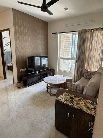 Living Room in 2 BHK Apartment at Lodha Amara, Kolshet Road – for Sale