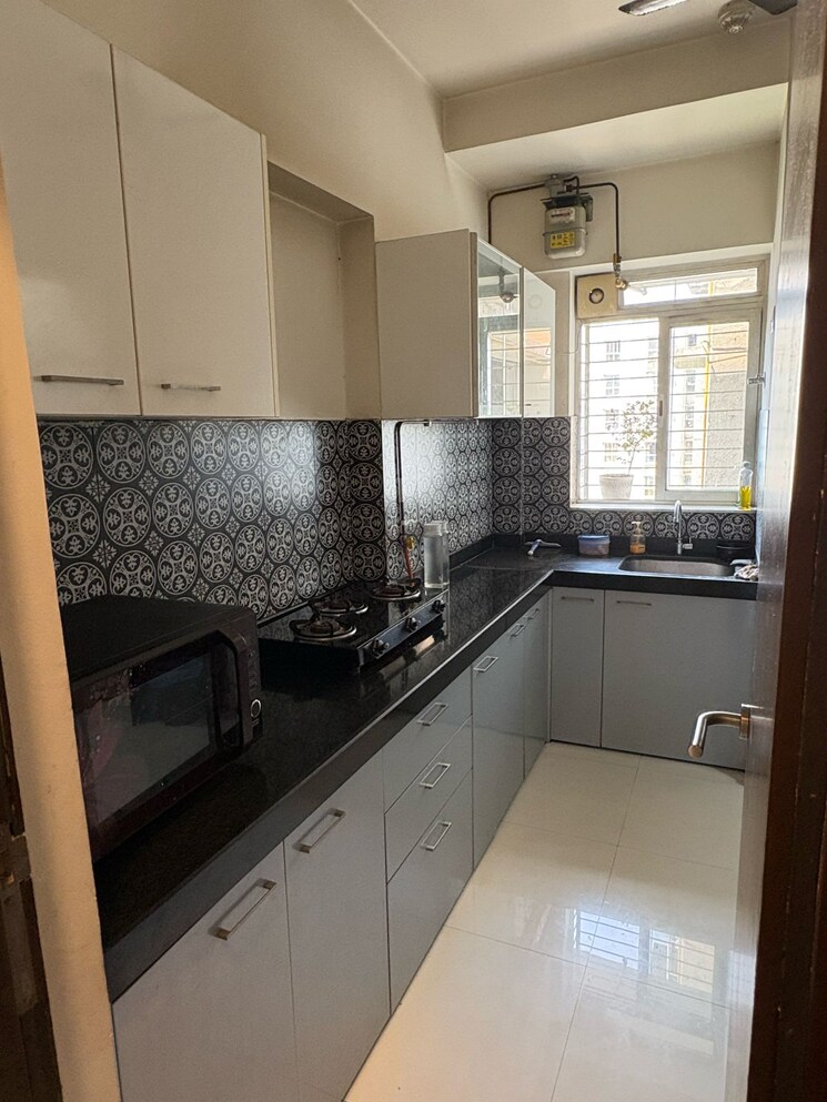 Kitchen, lodha-amara 2 Bedroom 672 Sq.Ft. Apartment In Kolshet Road Thane 9527108