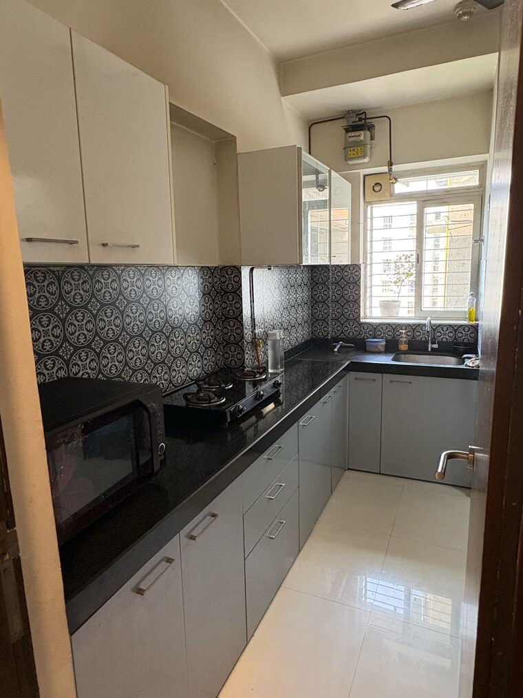 Kitchen, lodha-amara 2 Bedroom 672 Sq.Ft. Apartment In Kolshet Road Thane 9527108