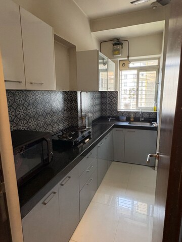 Kitchen in 2 BHK Apartment at Lodha Amara, Kolshet Road – for Sale
