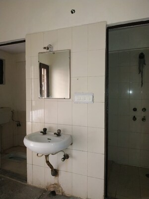 Bathroom in 1 BHK Apartment at Jasola Vihar – for Sale