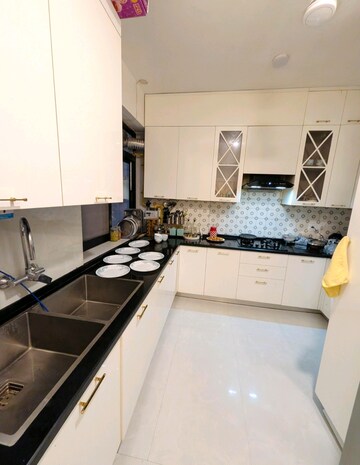 Kitchen in 3 BHK Apartment at Conscient Heritage Max, Sector 102 – for Rent