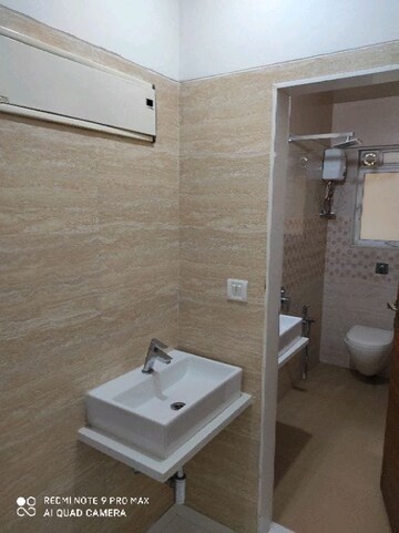 Bathroom in 2 BHK Apartment at Neminath Palace, Santacruz East – for Rent