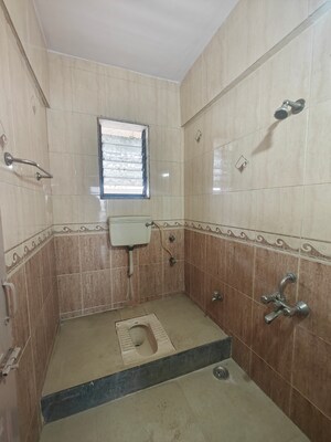 Bathroom in 2 BHK Apartment at Nandidham CHS, Seawoods – for Rent