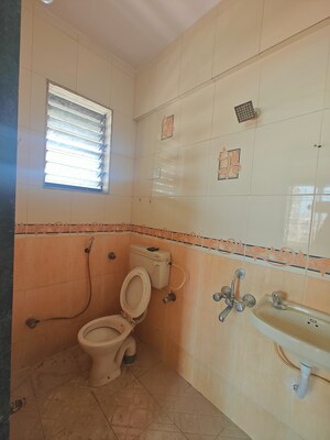 Bathroom in 2 BHK Apartment at Nandidham CHS, Seawoods – for Rent