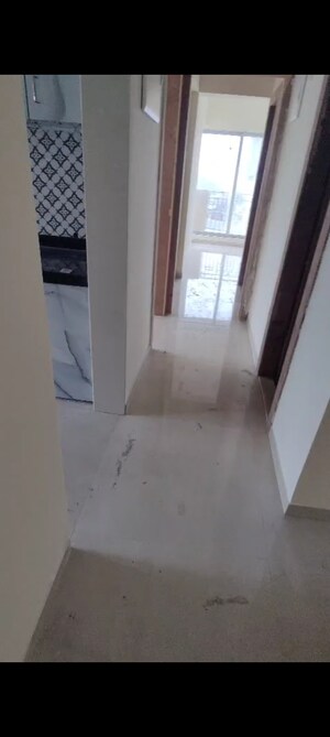 Building Lobby in 2 BHK Apartment at Shree Tirupati STG Signature Residency, Patlipada – for Rent