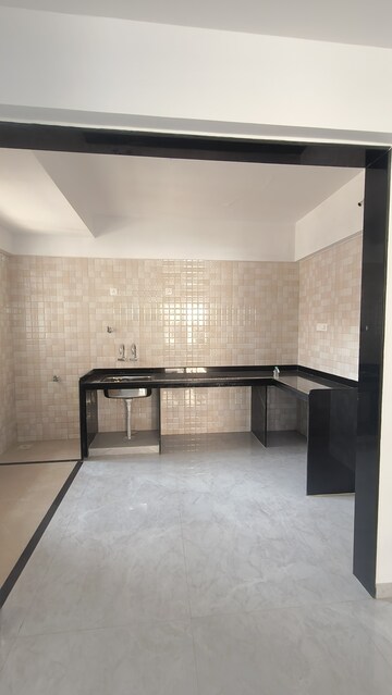 Kitchen in 3 BHK Apartment at Sai Pleasure, Wakad – for Sale