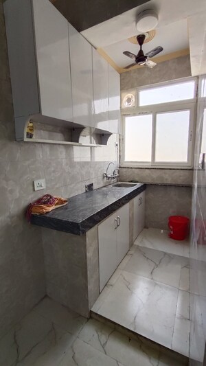 Kitchen in 1 RK Apartment at Mittal Cosmos Executive Apartment, Sector 2 – for Rent