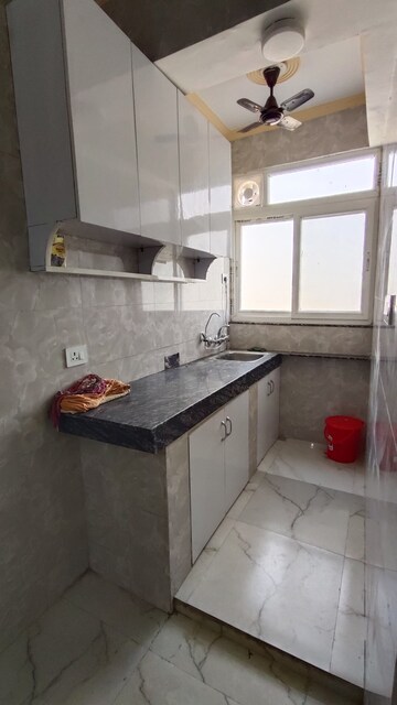 Kitchen in 1 RK Apartment at Mittal Cosmos Executive Apartment, Sector 2 – for Rent