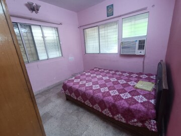 Bedroom in 1 BHK Apartment at New Jay Palace, Yari Road – for Rent