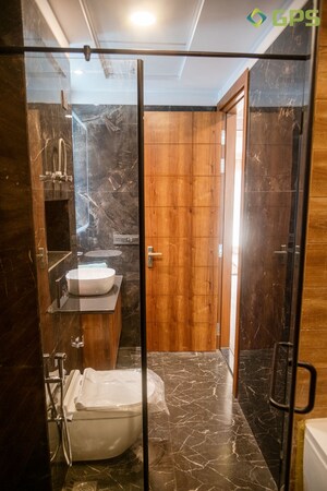 Bathroom in 4 BHK Builder Floor at Ansal API Esencia, Sector 67 – for Sale