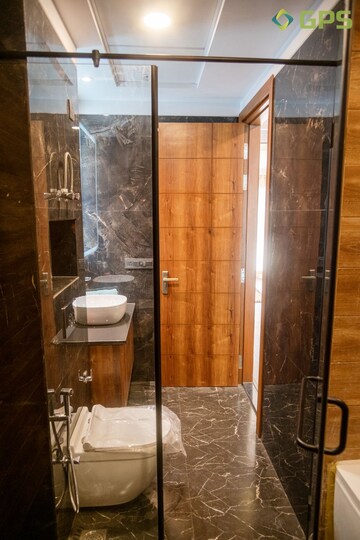 Bathroom in 4 BHK Builder Floor at Ansal API Esencia, Sector 67 – for Sale