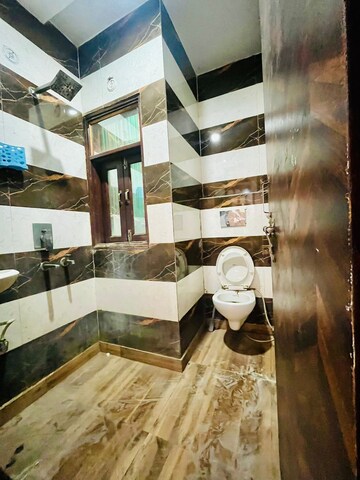Bathroom in 3 BHK Builder Floor at Dwarka Mor – for Rent